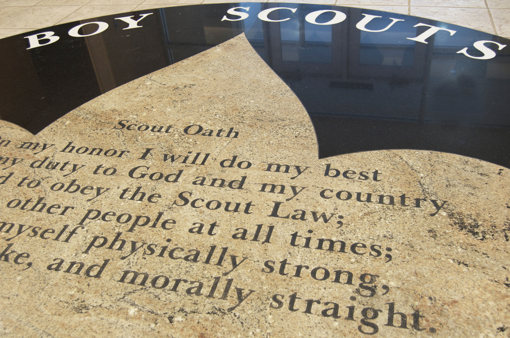 Boy Scout oath engraved on tile floor