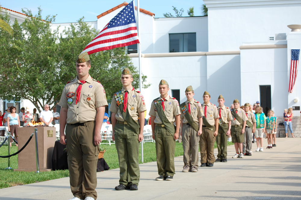 Boy Scouts standing at attention in Memorial Day ceremony